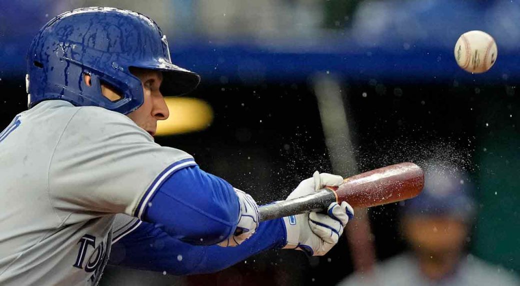 With bats characteristically quiet, Blue Jays lose to rain, Royals in series finale