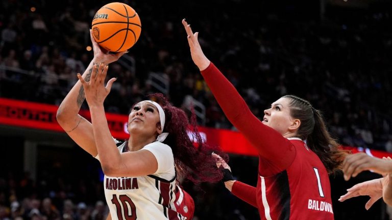South Carolina centre Kamilla Cardoso shoots over North Carolina State centre River Baldwin during the first half of a Final Four college basketball game in the women's NCAA Tournament, Friday, April 5, 2024, in Cleveland. (Morry Gash/AP Photo)