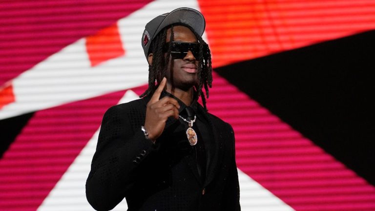Ohio State wide receiver Marvin Harrison Jr. celebrates after being chosen by the Arizona Cardinals with the fourth overall pick during the first round of the NFL football draft, Thursday, April 25, 2024, in Detroit. (Jeff Roberson/AP Photo)