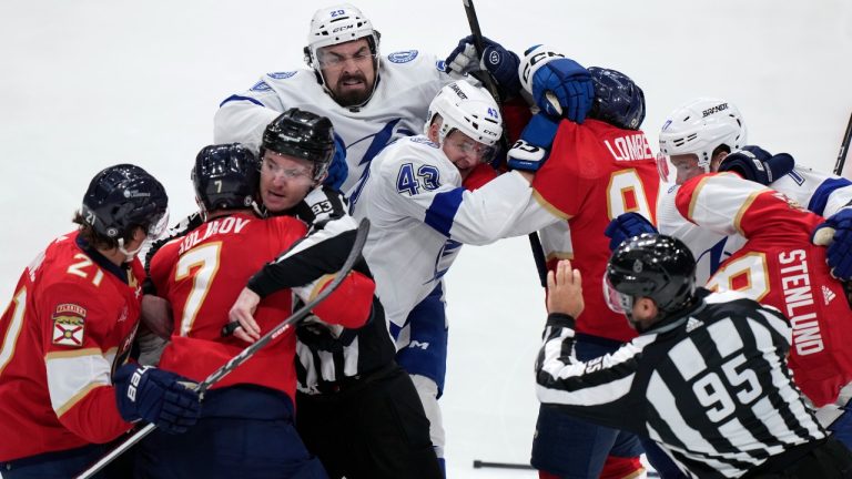 Players scuffle during the second period of an NHL hockey game between the Florida Panthers and the Tampa Bay Lightning, Saturday, March 16, 2024, in Sunrise, Fla. (AP Photo/Wilfredo Lee)