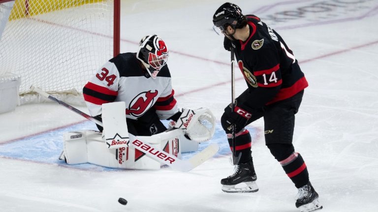 Ottawa Senators left wing Boris Katchouk looks for the rebound from New Jersey Devils goaltender Jake Allen
during first period NHL action in Ottawa, Saturday, April 6, 2024. (Adrian Wyld/CP)