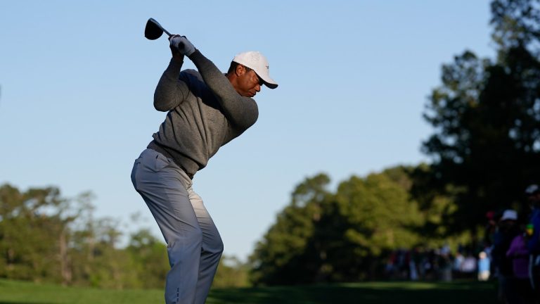 Tiger Woods hits his tee shot on the 15th hole during the weather delayed first round at the Masters golf tournament at Augusta National Golf Club Friday, April 12, 2024, in Augusta, Ga. (AP/George Walker IV)