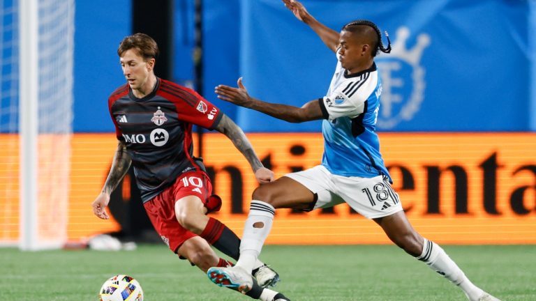 Toronto FC forward Federico Bernardeschi, left, and Charlotte FC forward Kerwin Vargas work for the ball during the second half of an MLS soccer match in Charlotte, N.C., Saturday, April 13, 2024. (Nell Redmond/AP)