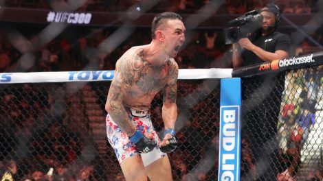 Max-Holloway-celebrates-after-knocking-out-Justin-Gaethje-in-the-fifth-round-of-a-lightweight-BMF-Title-bout-during-UFC-300