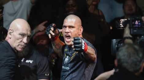Alex-Pereira-mimes-shooting-an-arrow-before-fighting-Jamahal-Hill-at-UFC-300