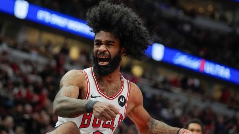 Chicago Bulls guard Coby White reacts after dunking the ball during the second half of an NBA basketball game against the Sacramento Kings Saturday, Feb. 3, 2024, in Chicago. (Erin Hooley/AP Photo)