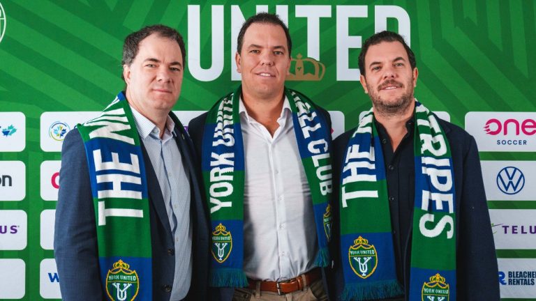 Brothers Miguel, Ricardo and Eduardo Pasquel (left to right) of Game Plan Sports Group, the owners of York United FC, are pictured at their official unveiling on Dec. 7, 2023. (CP/HO-David Chant/York United FC)