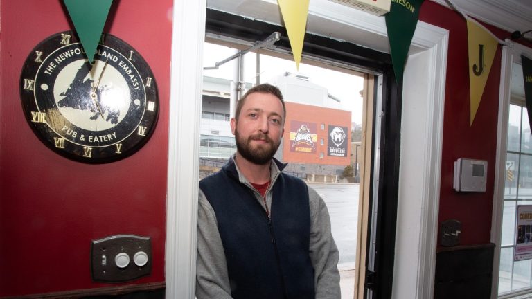 The Newfoundland Embassy pub owner Niall Hickey poses in his establishment across from the Mary Brown Centre, home of Newfoundland Growlers hockey team, on Wednesday, April 3, 2024. The sudden end of the Growlers has left sports fans crushed and business owners anxious in a capital city spurned three times before by professional hockey teams. (Paul Daly/THE CANADIAN PRESS)