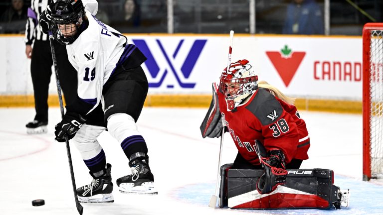 Minnesota's Maggie Flaherty (19) looks for a deflection chance in front of Ottawa goaltender Emerance Maschmeyer (38) during first period PWHL hockey action in Ottawa, on Saturday, April 20, 2024. (Justin Tang/CP)