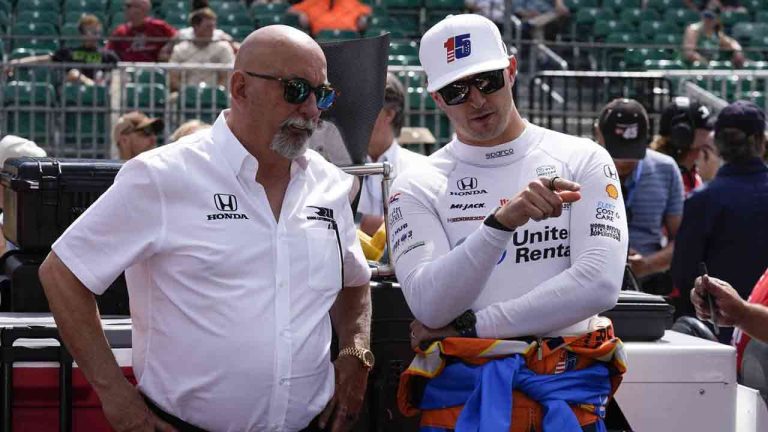 Graham Rahal, right, talks with his dad, Bobby Rahal, during qualifications for the Indianapolis 500 auto race at Indianapolis Motor Speedway, Saturday, May 18, 2024, in Indianapolis. (Darron Cummings/AP)