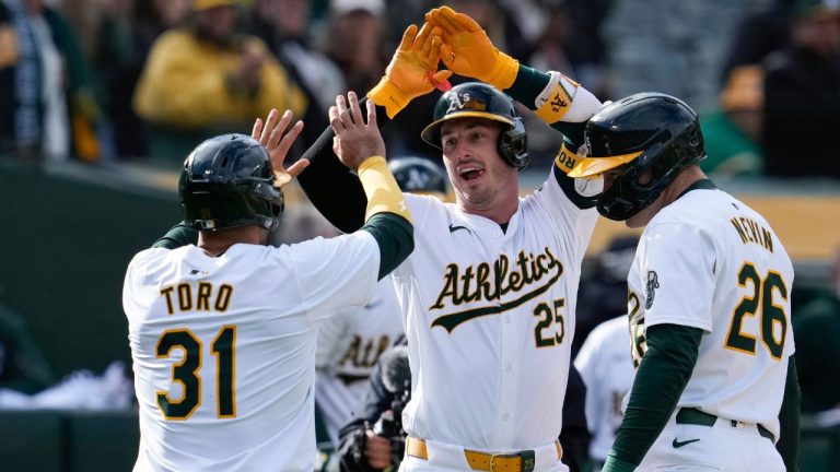 Oakland Athletics' Brent Rooker celebrates with Abraham Toro and Tyler Nevin after hitting a three-run home run against the Miami Marlins during the third inning of a baseball game Saturday, May 4, 2024, in Oakland, Calif. (Godofredo A. Vásquez/AP Photo)