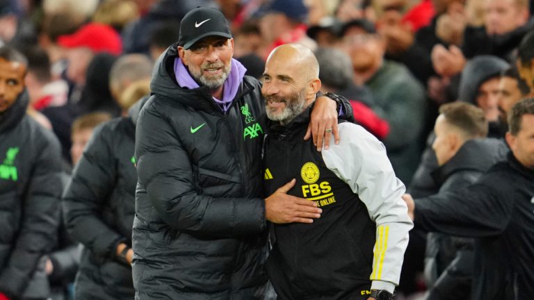 Liverpool's manager Jurgen Klopp, left, gestures with Leicester's head coach Enzo Maresca at the end of the English League Cup third round soccer match between Liverpool and Leicester City at the Anfield stadium in Liverpool, England, Wednesday, Sept. 27, 2023. (Jon Super/AP) 