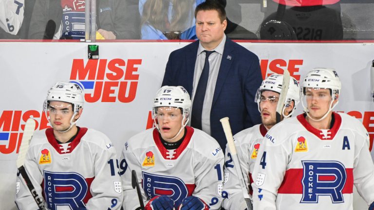 Laval Rocket head coach Jean-François Houle looks on from the bench during first period AHL hockey action against the Syracuse Crunch in Laval, Que., Friday, December 29, 2023. (Graham Hughes/CP)