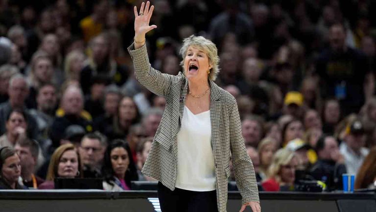 Iowa head coach Lisa Bluder directs her team during the second half of a Final Four college basketball game against UConn in the women's NCAA Tournament, Friday, April 5, 2024, in Cleveland. (Carolyn Kaster/AP)