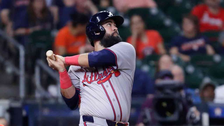 Atlanta Braves Luis Guillorme watches his two-run double next to Houston Astros catcher Yainer Diaz during the ninth inning of a baseball game Tuesday, April 16, 2024, in Houston. (Michael Wyke/AP)