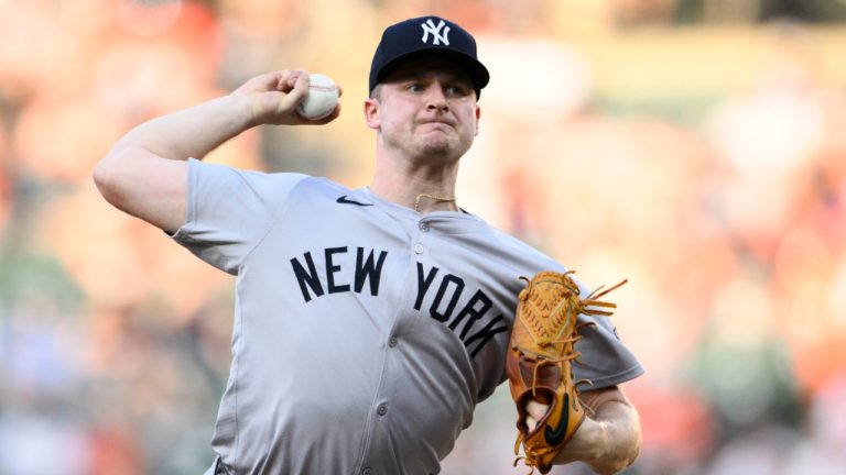 New York Yankees pitcher Clarke Schmidt will be sidelined indefinitely due to a right lat strain. (Nick Wass/AP) 