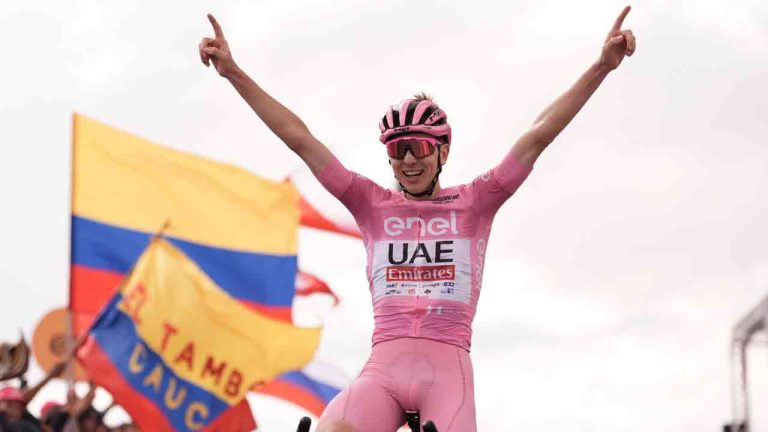 Tadej Pogačar celebrates as he wins at the end of the 15th stage of the Giro d'Italia from Manerba del Garda to Livigno, Italy, Sunday, May 19, 2024. (Gian Mattia D'Alberto/LaPresse via AP)