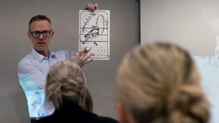 Professional Women's Hockey League New York head coach Howie Draper goes over a play with the team the morning of the inaugural PWHL game in Toronto, Monday, Jan. 1, 2024. (Brittany Peterson/AP) 