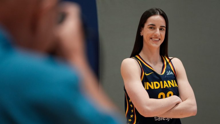 Indiana Fever's Caitlin Clark poses for a photo during the Indiana Fever's WNBA basketball media day, Wednesday, May 1, 2024, in Indianapolis. (AP Photo/Darron Cummings)