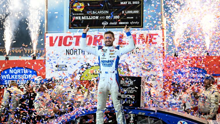 FILE - Kyle Larson (5) celebrates in Victory Lane after winning the NASCAR All-Star Cup Series auto race at North Wilkesboro Speedway, Sunday, May 21, 2023, in North Wilkesboro, N.C. (Matt Kelley, File/AP)
