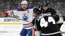 Kings’ Mikey Anderson exits, then returns in Game 5 after colliding with Oilers’ McDavid