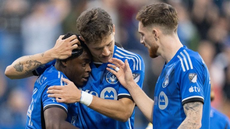CF Montreal forward Sunusi Ibrahim celebrates his goal over D.C. United with teammates Joaquin Sosa and Joel Waterman during first half MLS soccer action in Montreal, Wednesday, May 29, 2024. (Christinne Muschi/CP Photo)
