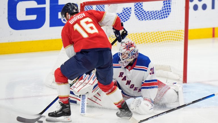 Florida Panthers center Aleksander Barkov (16) attempts a shot at New York Rangers goaltender Igor Shesterkin (31) during the first period of Game 4 during the Eastern Conference finals of the NHL hockey Stanley Cup playoffs, Tuesday, May 28, 2024, in Sunrise, Fla. (AP Photo/Wilfredo Lee)
