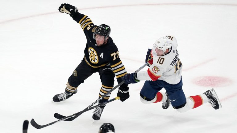 Florida Panthers' Vladimir Tarasenko (10) shoots on goal as Boston Bruins' Charlie McAvoy (73) defends during the first period in Game 6 of an NHL hockey Stanley Cup second-round playoff series, Friday, May 17, 2024, in Boston. (Michael Dwyer/AP)