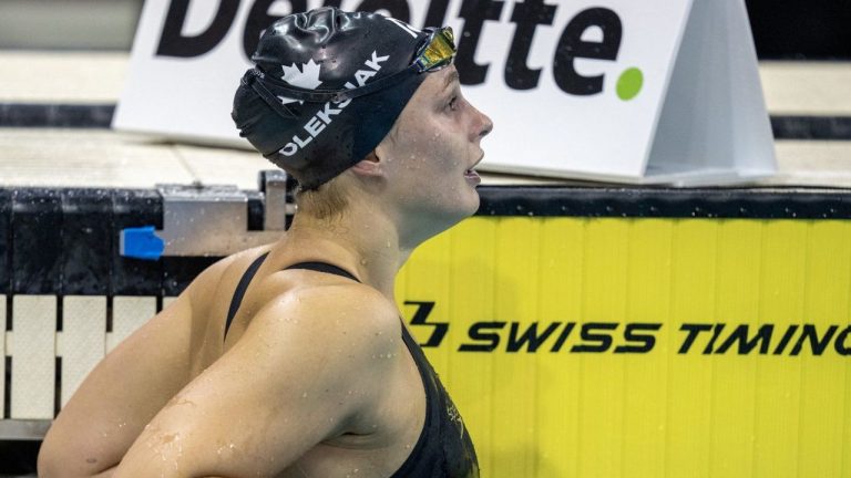 Penny Oleksiak leans on the side of the pool following the women's 200m freestyle at the Canadian Olympic Swim Trials in Toronto on Tuesday May 14, 2024. (Frank Gunn/CP Photo)

