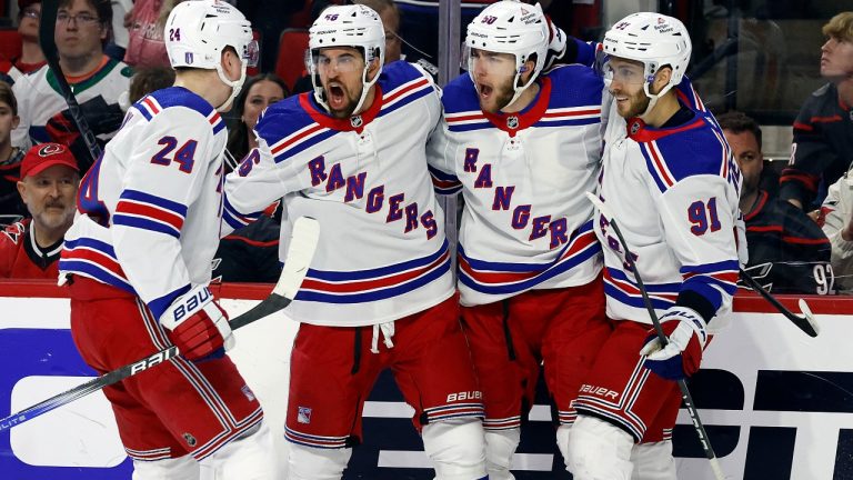 New York Rangers congratulate Will Cuylle, second from right, during the first period in Game 4 of an NHL hockey Stanley Cup second-round playoff series against the Carolina Hurricanes in Raleigh, N.C., Saturday, May 11, 2024. (Karl B DeBlaker/AP)