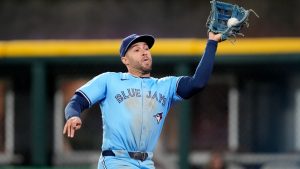 Toronto Blue Jays right fielder George Springer catches a fly ball in foul territory hit by Chicago White Sox's Corey Julks during the fifth inning of a baseball game Tuesday, May 28, 2024, in Chicago. (Charles Rex Arbogast/AP)