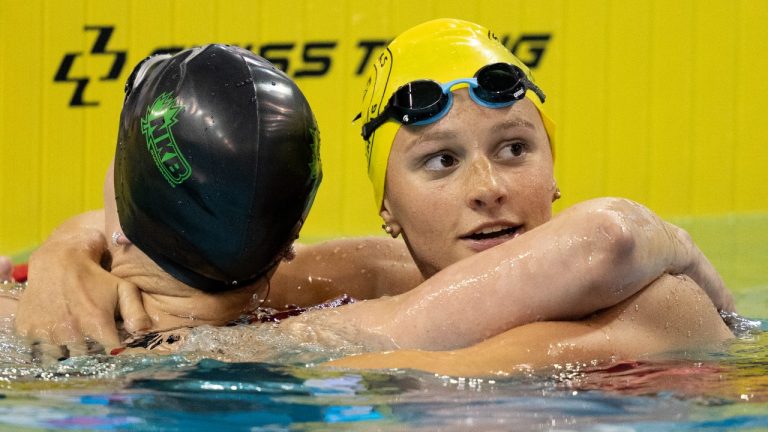 Summer McIntosh hugs Julie Brousseau after winning the women's 200m freestyle at the Canadian Olympic Swim Trials in Toronto on Tuesday May 14, 2024. (Frank Gunn/CP)