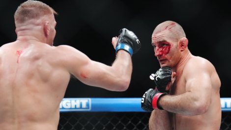 Sean-Strickland,-right,-fights-Dricus-Du-Plessis-during-a-middleweight-title-bout-at-UFC-297-in-Toronto