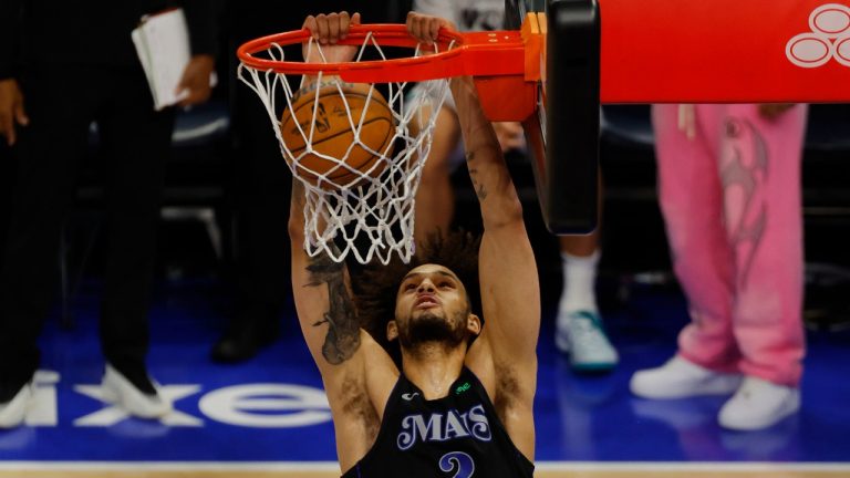 Dallas Mavericks centre Dereck Lively II (2) dunks against the Minnesota Timberwolves during the second half of Game 2 of the NBA basketball Western Conference finals, Friday, May 24, 2024, in Minneapolis. (Bruce Kluckhohn/AP)