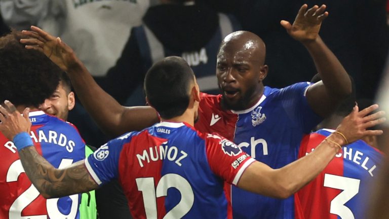 Crystal Palace's Jean-Philippe Mateta, right, celebrates with teammates after scoring his side's second goal during the English Premier League soccer match between Crystal Palace and Manchester United at Selhurst Park stadium in London, England, Monday, May 6, 2024. (Ian Walton/AP Photo)