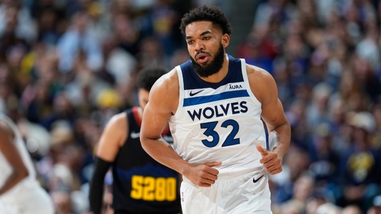 Minnesota Timberwolves center Karl-Anthony Towns (32) turns back on defense after hitting a basket in the first half of Game 2 of an NBA basketball second-round playoff series against the Denver Nuggets, Monday, May 6, 2024, in Denver. (David Zalubowski/AP)