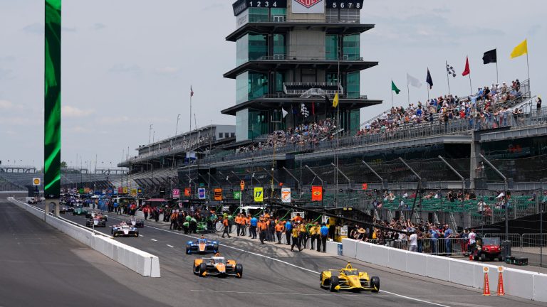 Scott McLaughlin, of New Zealand, leads a group of cars onto the track during a practice session for the Indianapolis 500 auto race at Indianapolis Motor Speedway, Monday, May 20, 2024, in Indianapolis. (Darron Cummings/AP)