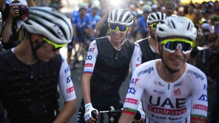 Slovenia's Tadej Pogacar, wearing a cooling vest, waits for the start of the second stage of the Tour de France cycling race over 199.2 kilometers (123.8 miles) with start in Cesenatico and finish in Bologna, Italy, Sunday, June 30, 2024. (Daniel Cole/AP)
