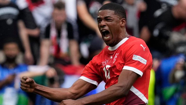 Switzerland's Kwadwo Duah celebrates after scoring his side's opening goal during a Group A match between Hungary and Switzerland at the Euro 2024 soccer tournament in Cologne, Germany, Saturday, June 15, 2024. (Darko Vojinovic/AP)
