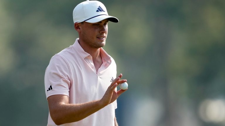 Ludvig Aberg, of Sweden, waves after making a putt on the 12th hole during the second round of the U.S. Open golf tournament Friday, June 14, 2024, in Pinehurst, N.C. (Matt York/AP)