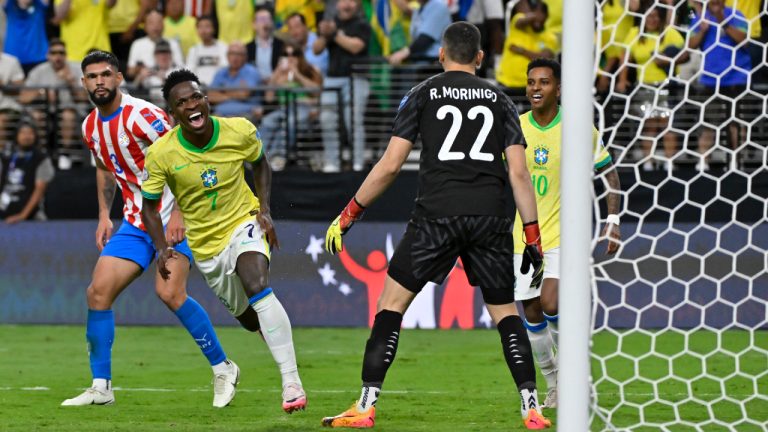 Brazil's Vinicius Junior (7) celebrates scoring his side's third goal against Paraguay with teammates during a Copa America Group D soccer match in Las Vegas, Friday, June 28, 2024. (David Becker/AP)