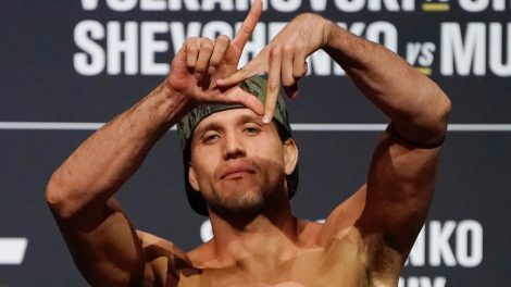 Brian-Ortega-poses-during-a-ceremonial-UFC-weigh-in