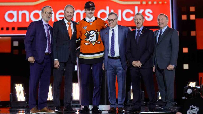 Beckett Sennecke, centre left, poses after being selected by the Anaheim Ducks during the first round round of the NHL hockey draft Friday, June 28, 2024, in Las Vegas. (Steve Marcus/AP)