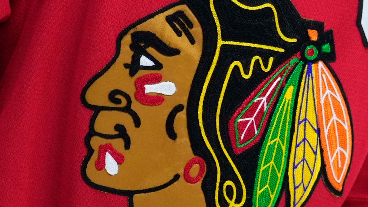 Blackhawks, former player settle lawsuit
