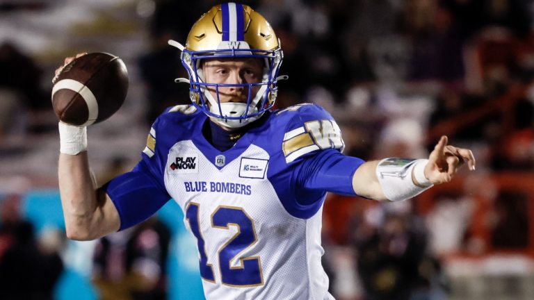 Winnipeg Blue Bombers quarterback Dakota Prukop points to a receiver during first half CFL football action against the Calgary Stampeders in Calgary, Alta., Friday, Oct. 27, 2023. THE CANADIAN PRESS/Jeff McIntosh