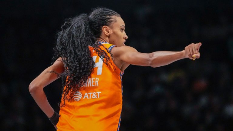 Connecticut Sun forward DeWanna Bonner reacts after scoring a three-point basket during the first half of Game 2 of a WNBA basketball playoffs semifinal against the New York Liberty, Tuesday, Sept. 26, 2023, in New York. (AP Photo/Mary Altaffer)