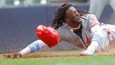Reds’ Elly De La Cruz scores all the way from second when pickoff throw goes into outfield