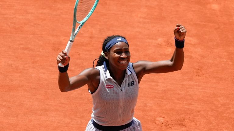 Coco Gauff of the U.S. celebrates winning her quarterfinal match of the French Open tennis tournament against Tunisia's Ons Jabeur at the Roland Garros stadium. (Thibault Camus/AP)