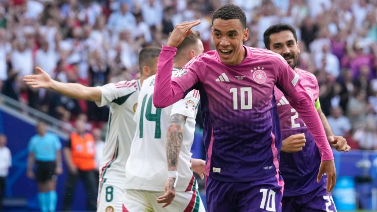 Germany's Jamal Musiala (10) celebrates after scoring during a Group A match between Germany and Hungary at the Euro 2024 soccer tournament in Stuttgart, Germany, Wednesday, June 19, 2024. (AP Photo/Darko Vojinovic)