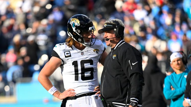 Jacksonville Jaguars quarterback Trevor Lawrence and coach Doug Pederson during a game against the Tennessee Titans, Jan. 7, 2024. (AP Photo/John Amis)